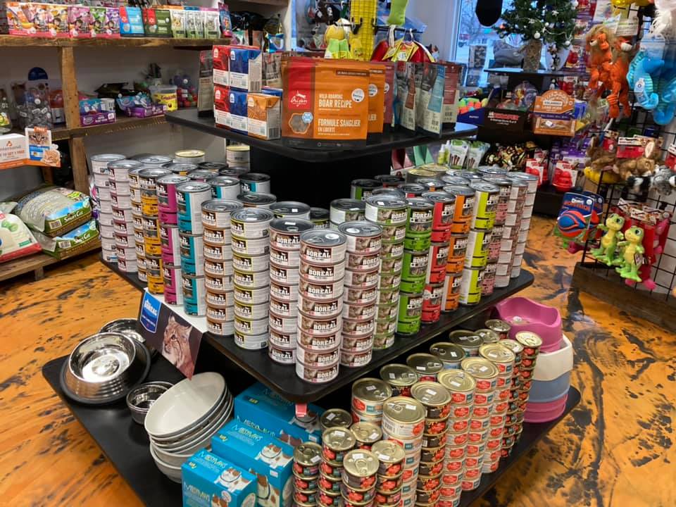 display of cat food, treats and accessories