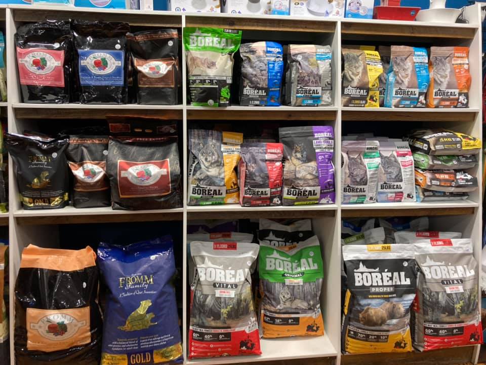 shelves lined with pet foods