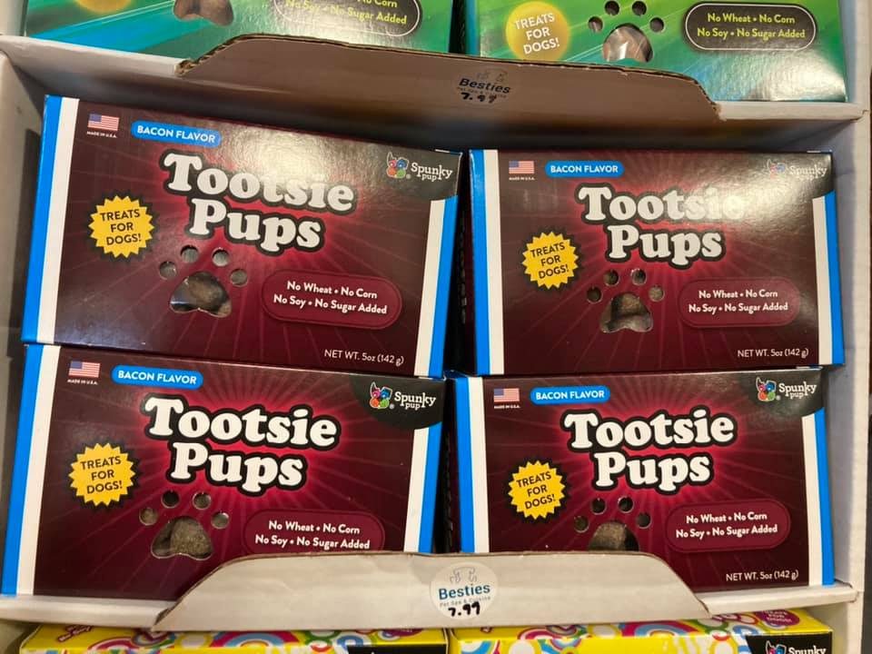 boxes of Tootsie Pups treats for dogs
