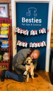 Besties valentine's day door with owner and dog snuggling
